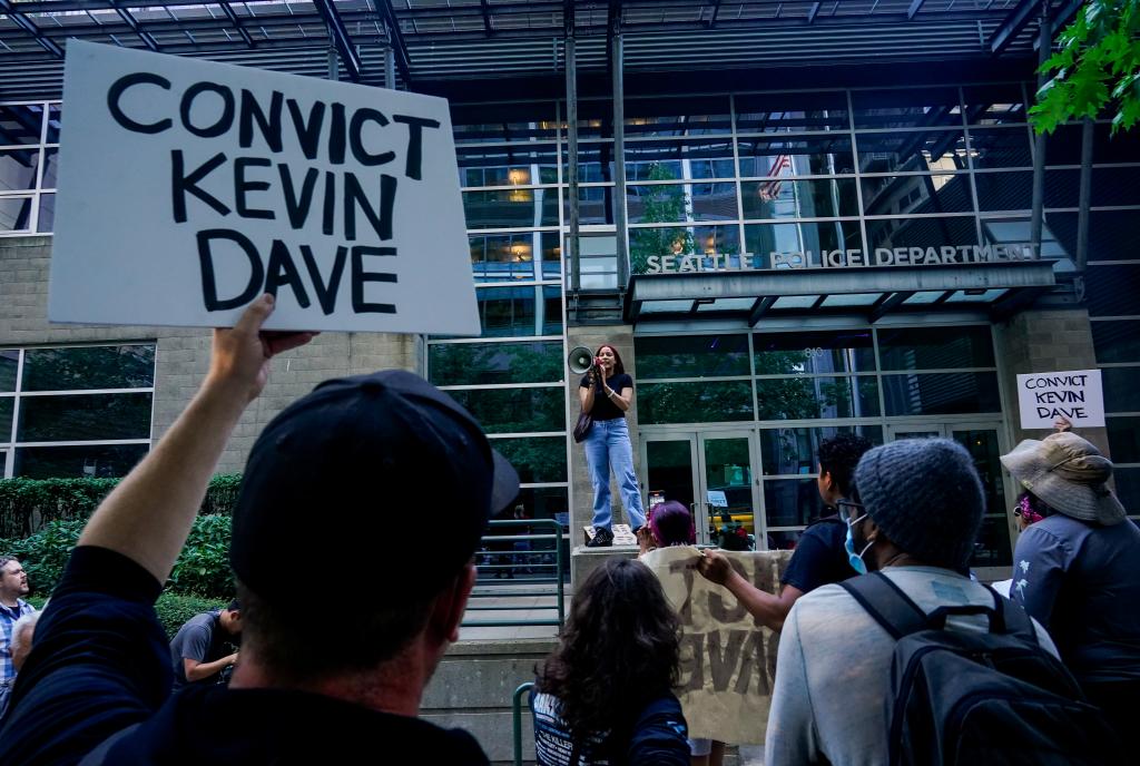 Protesters call for cop to be convicted