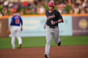 Lane Thomas, pictured during spring training, will be a key part of the Nationals' outfield in 2024.