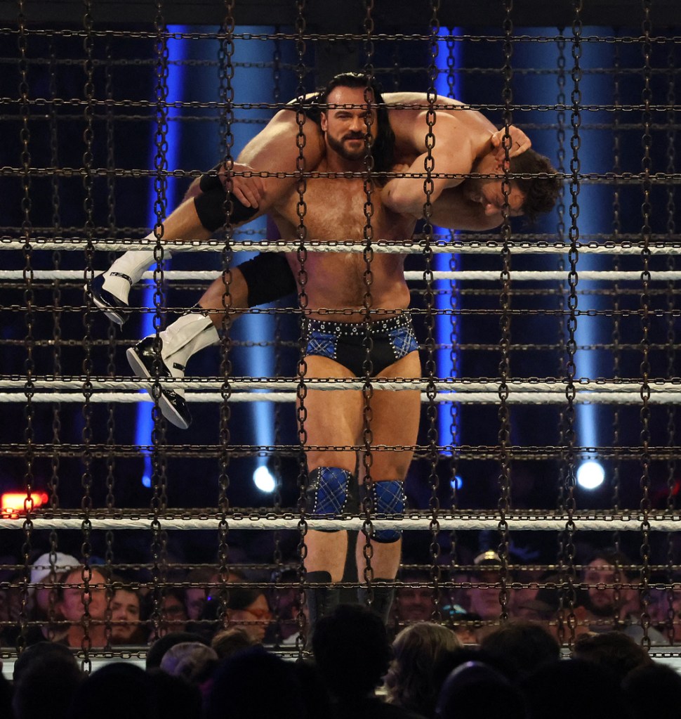 Logan Paul, Randy Orton, Drew McIntyre, Bobby Lashley, LA Knight and Kevin Owens at the WWE Elimination Chamber at Optus Stadium.