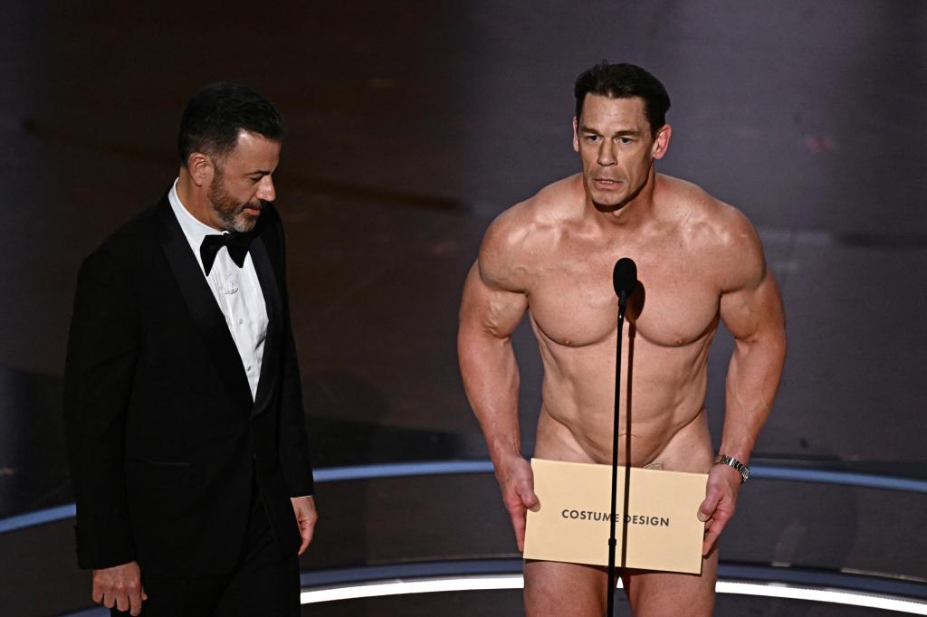 Jimmy Kimmel and John Cena onstage during Cena's "nude" skit on Sunday night's 96th Academy Awards.