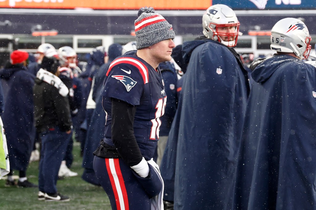 Football player Mac Jones looking on after a game against the New York Jets at Gillette Stadium in Foxborough, Massachusetts.