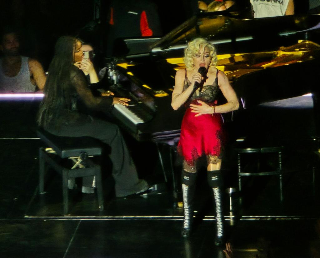 Madonna and daughter, Mercy James, perform at The Forum, in LA.