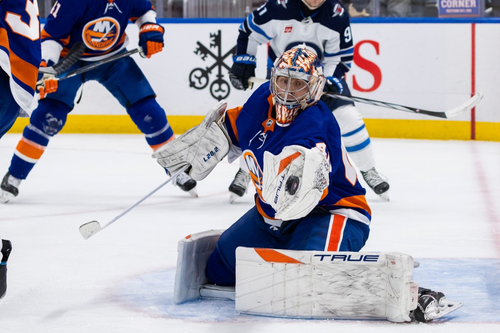 New York Islanders goaltender Semyon Varlamov (40) makes a save.