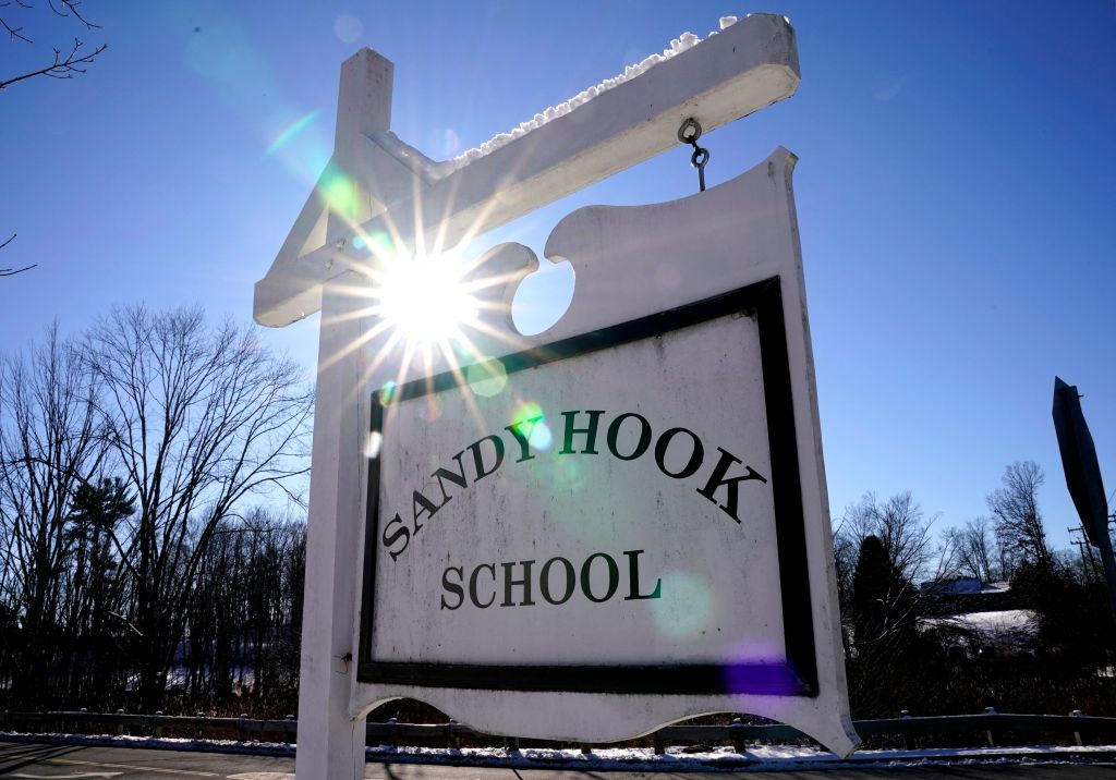 A sign for Sandy Hook Elementary School in Newtown, Connecticut, on December 13, 2022. - The memorial  honors the twenty children and six educators who were victims of the Sandy Hook Elementary School shooting on the morning of Dec. 14, 2012.