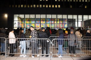 Migrants waiting to enter 26 Federal Plaza in Manhattan on March 12, 2024.