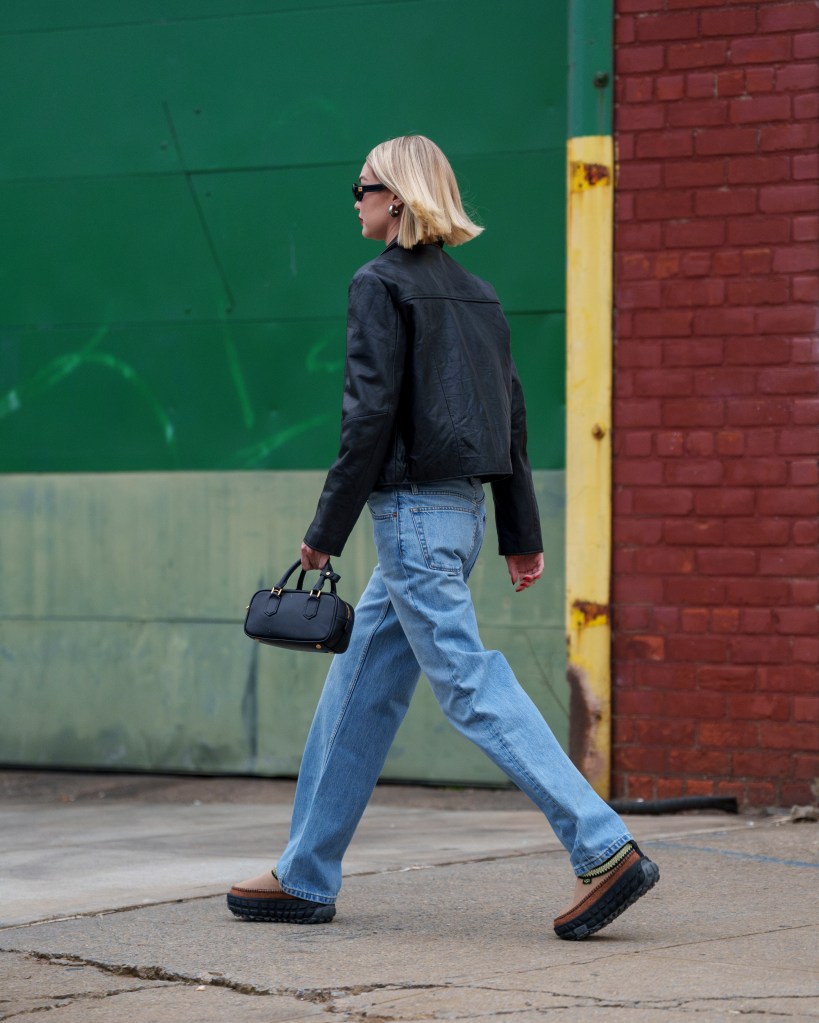 Model Gigi Hadid walking on the streets of Brooklyn, New York City, sporting the latest 'ugly' shoe trend, Venture Daze clogs, on March 22, 2024