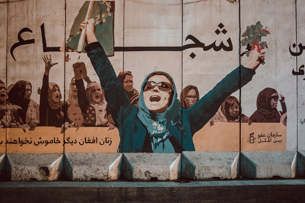 Shown above is a mural of women celebrating empowerment that was once on the Ministry of Women's Affairs. 