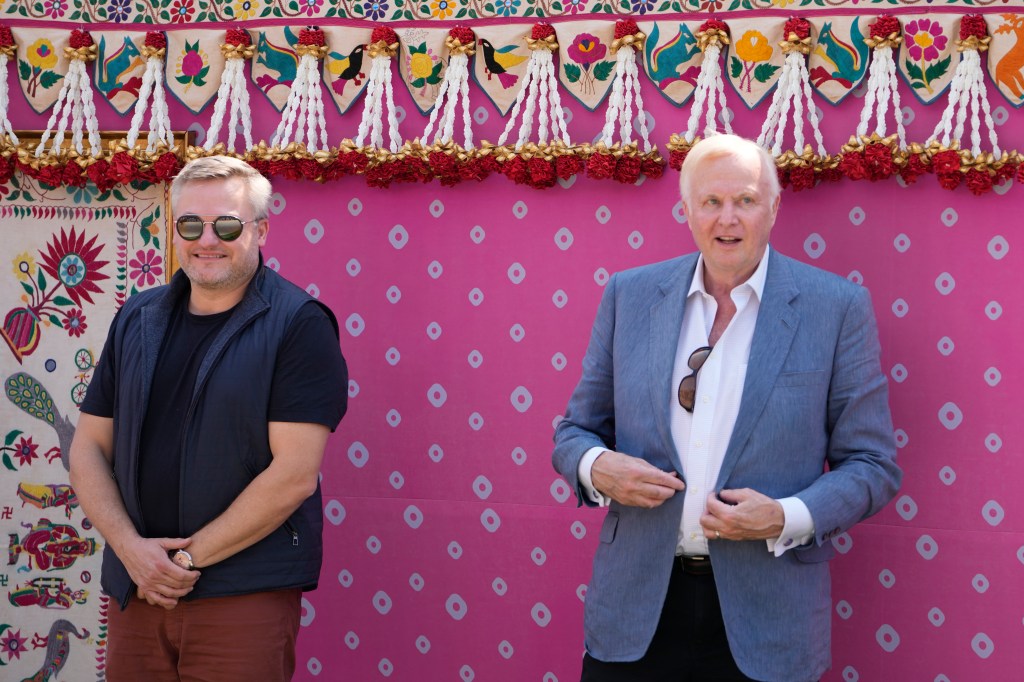 Murray Auchincloss, left, CEO of BP and Bob Dudley, former CEO of BP, pose for a photograph as they arrive to attend the pre-wedding bash.