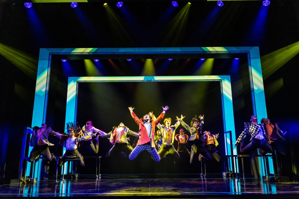 The cast of Tommy onstage at the Nederlander Theater. 