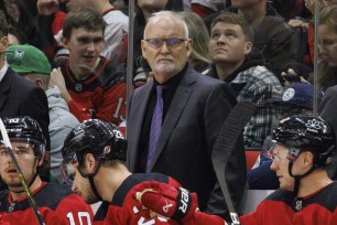 New Jersey Devils' head coach Lindy Ruff looks towards the ice