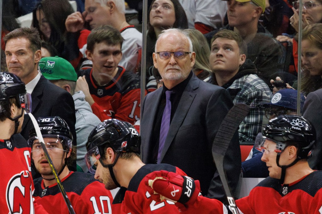 New Jersey Devils' head coach Lindy Ruff looks towards the ice