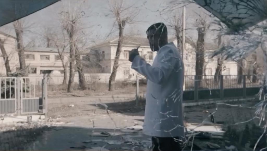 A promotional video shows a model wearing the Stalin jacket while walking through the ruins of a bombed-out city in Ukraine.