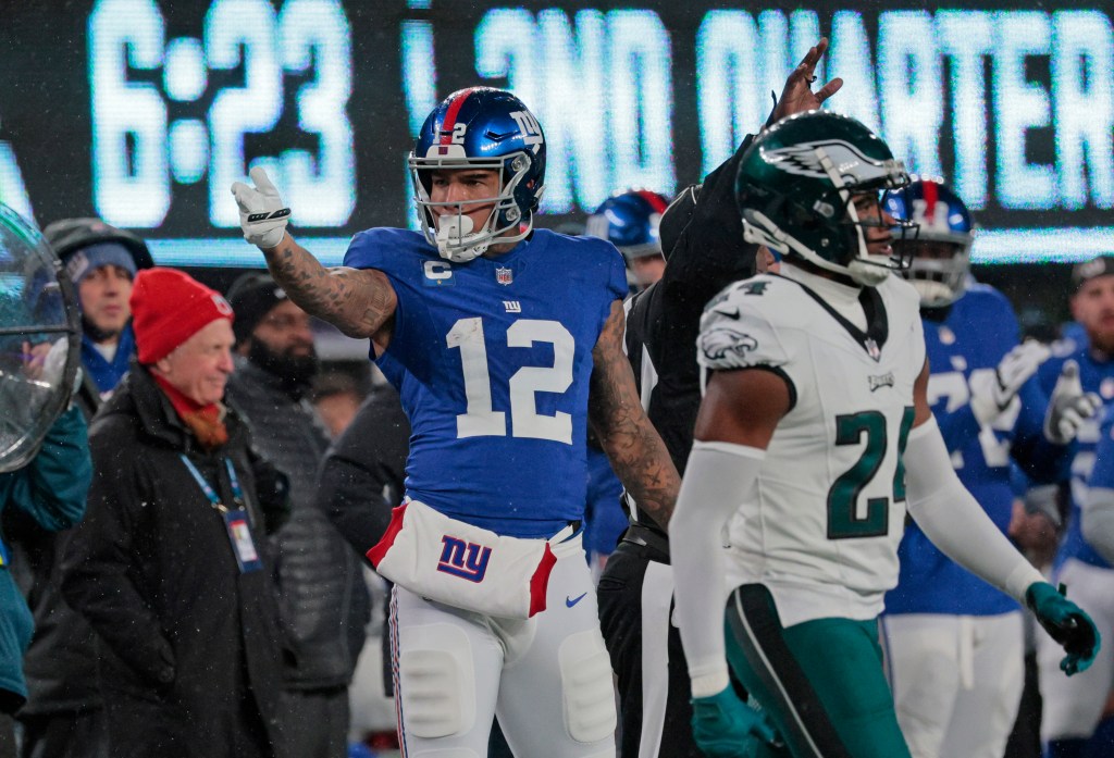 Darren Waller catching a pass with James Bradberry defending him, during the Eagles vs. Giants game, at MetLife stadium, captured by Charles Wenzelberg.