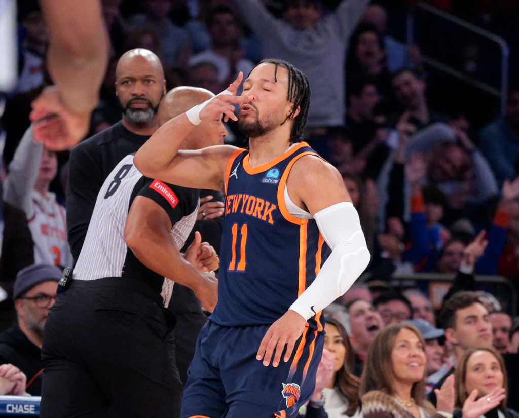 Jalen Brunson reacts after hitting a 3-point shot in his first game back since suffering a knee contusion.