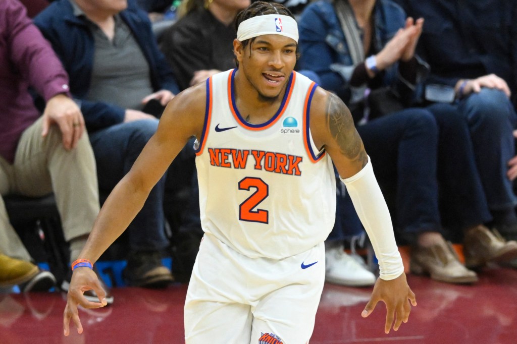 Knicks guard Miles McBride (2) celebrates his three-point basket in the fourth quarter against the Cleveland Cavaliers at Rocket Mortgage Field House.