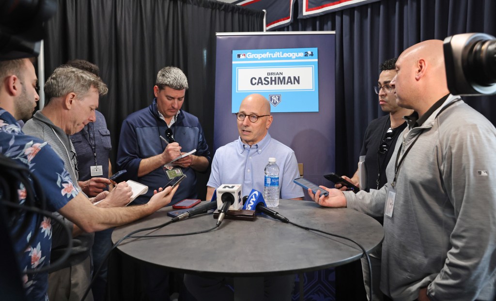 Yankees GM Brian Cashman speaking to the media during Spring Training Media Day