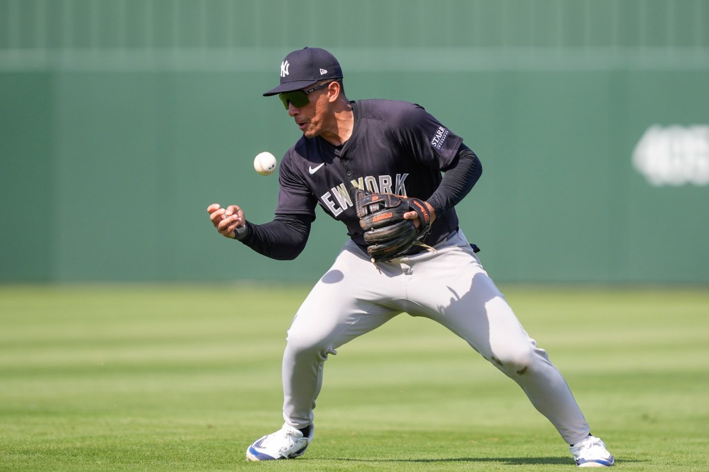 Yankees second baseman Jahmai Jones juggles a ground out by Minnesota Twins Anthony Prato to end the sixth inning of a spring training baseball game.