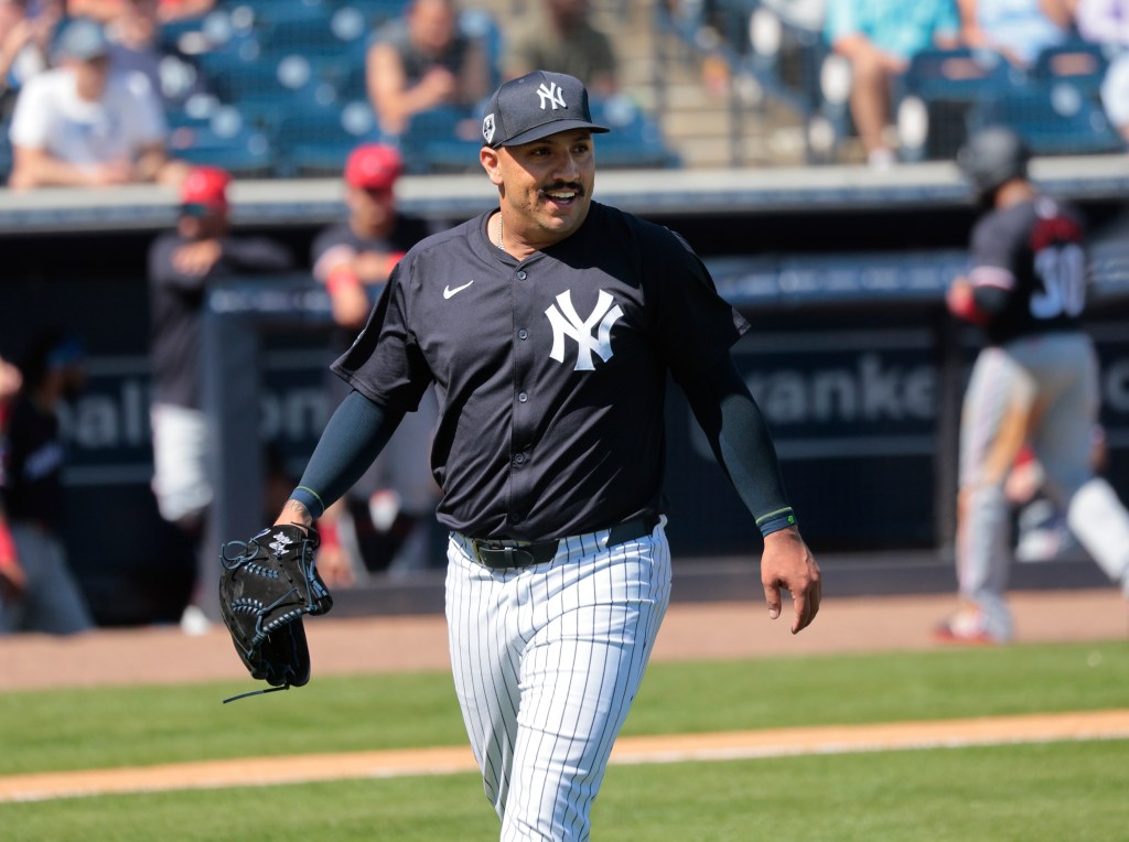 Yankees starting pitcher Nestor Cortes #65, reacts after striking out Minnesota Twins catcher Jair Camargo #85, with the bases loaded to end the 1st inning.