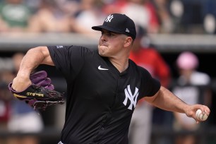 Carlos Rodon throw the ball during the third inning during a spring training game on Wednesday.