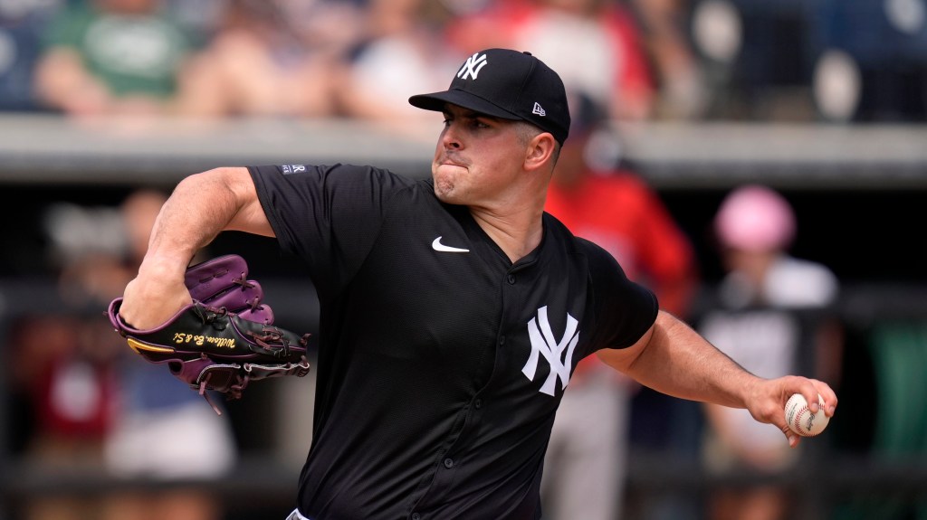 Carlos Rodon throw the ball during the third inning during a spring training game on Wednesday.