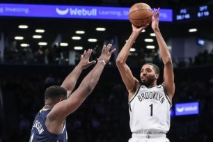 Mikal Bridges shoots a jumper over Zion Williamson during the Nets' 104-91 loss to Pelicans.