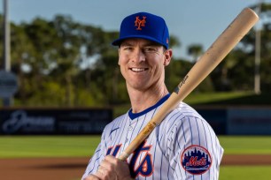 Joey Wendle poses for a picture during Photo Day at the start of Mets' spring training.