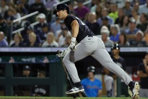 Spencer Jones, singling earlier in spring training, belted two home runs in the Yankees' inaugural Spring Breakout game.