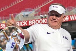 Brian Kelly, a man in a white shirt representing LSU