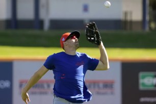 Brandon Nimmo, catching a fly ball during an earlier spring training practice, played center field in the Mets' 6-1 exhibition win over the Astros as Harrison Bader had a scheduled day off.