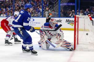 Brayden Point scores the first of his three goals on Igor Shesterkin during the Rangers' 6-3 loss to the Lightning.