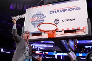 Dan Hurley, celebrating after UConn captured the Big East Tournament title, said he believes the Big East deserves six bids into the NCAA Tournament.