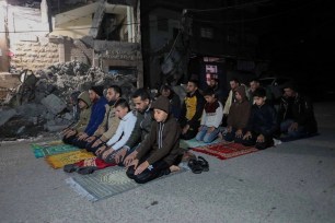 Palestinians praying on the first day of Ramadan in Rafah in the Gaza Strip on March 11, 2024.