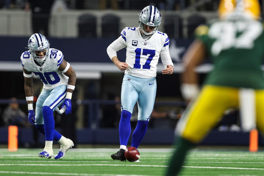  Brandon Aubrey (17) of the Dallas Cowboys makes an onside kick during an NFL wild-card playoff football game against the Green Bay Packers in January 2024.