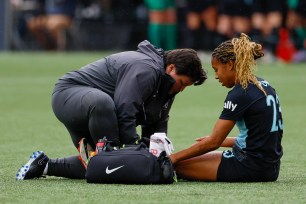 NJ/NY Gotham FC forward Margaret Purce (23) receiving on-field assistance during a match against Portland Thorns FC