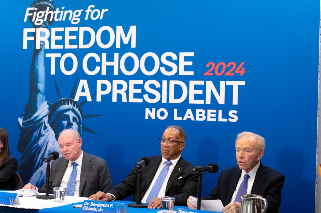 No Labels leadership and guests from left, Dan Webb, National Co-Chair Dr. Benjamin F. Chavis, and founding Chairman and former Sen. Joe Lieberman, speak about the 2024 election at National Press Club, in Washington, Jan. 18, 2024.