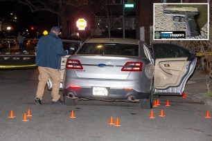 NYPD officers investigate scene of officer-involved shooting in Brooklyn, where a car with its four doors open is behind crime scene tape; Firearm