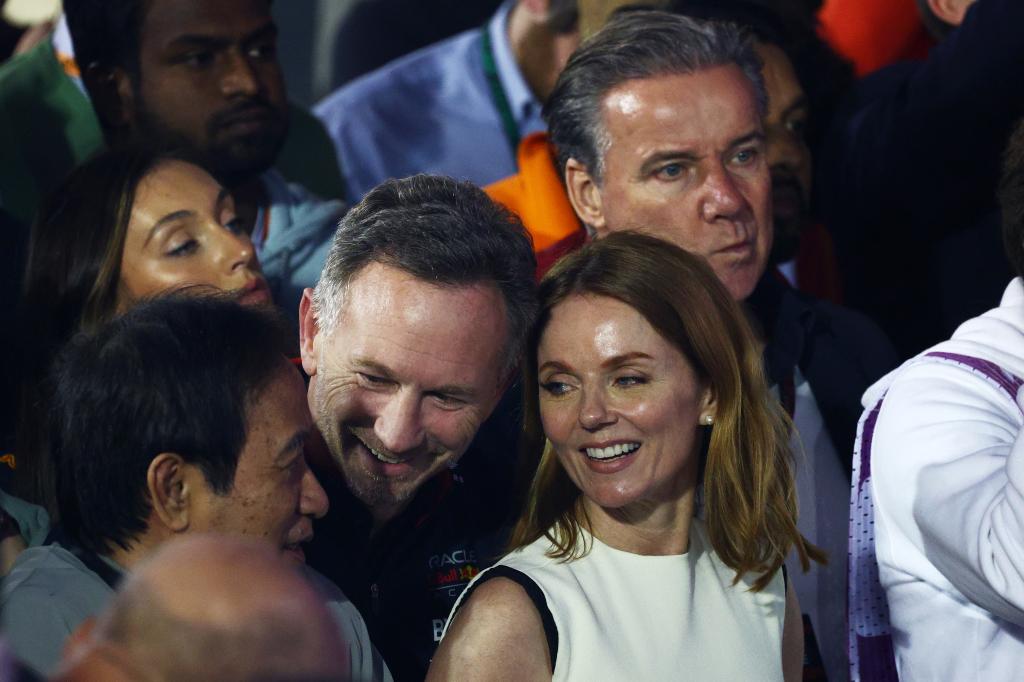 Oracle Red Bull Racing Team Principal Christian Horner and Geri Halliwell chat after a big day for the team on Saturday.