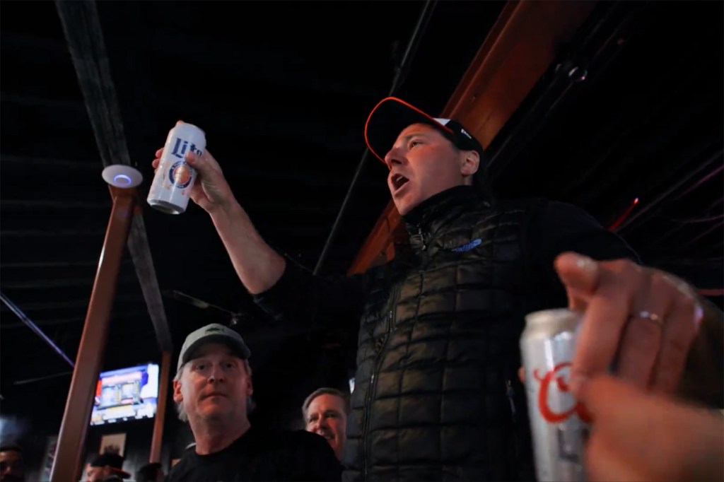 Mike Arougheti talks to fans Thursday at Pickles Pub in Baltimore.