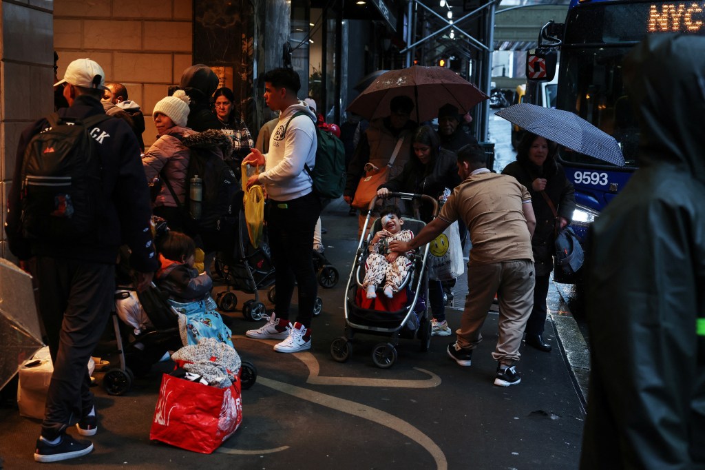 Migrants outside the Roosevelt Hotel