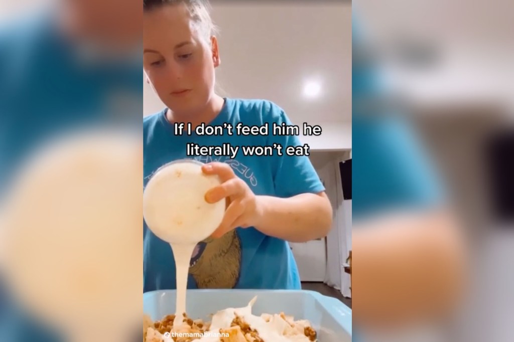 A woman pouring white liquid into a bowl of food - preparing nachos for her picky eating husband who refused to eat the salmon dinner she had cooked.