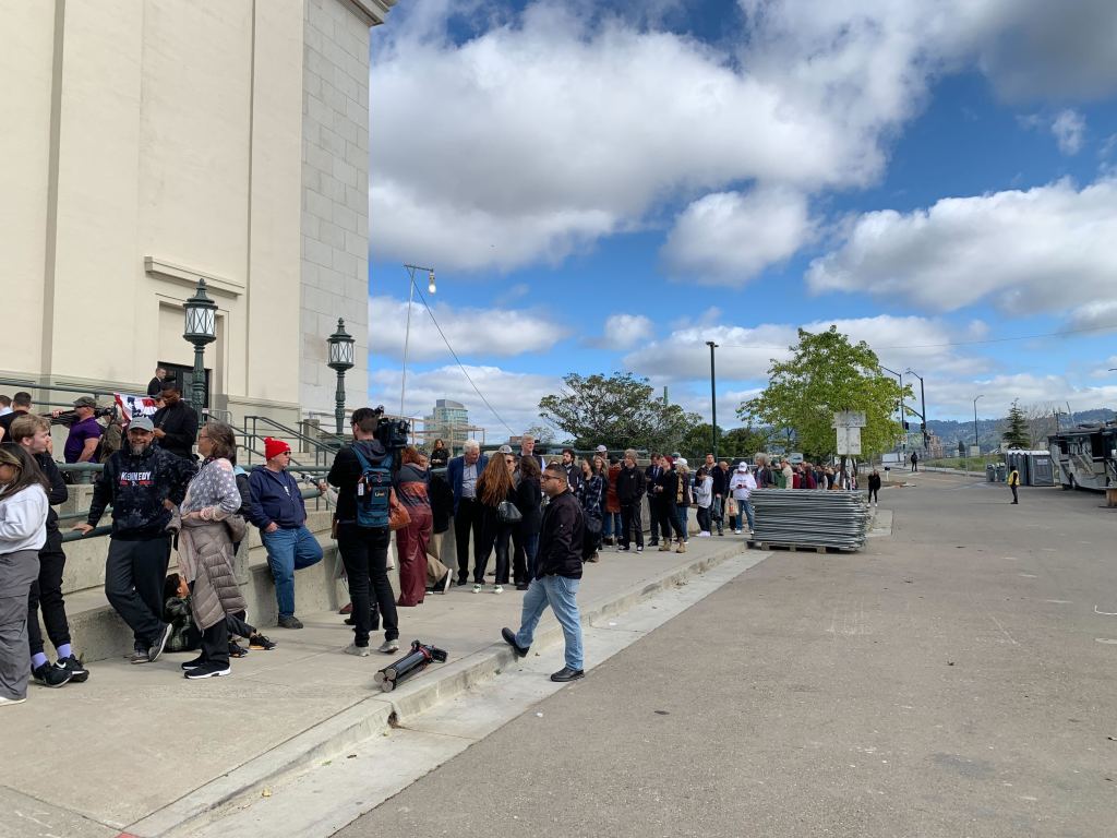 Supporters stand in line to get access to the Henry J. Kaiser Center for the Arts.