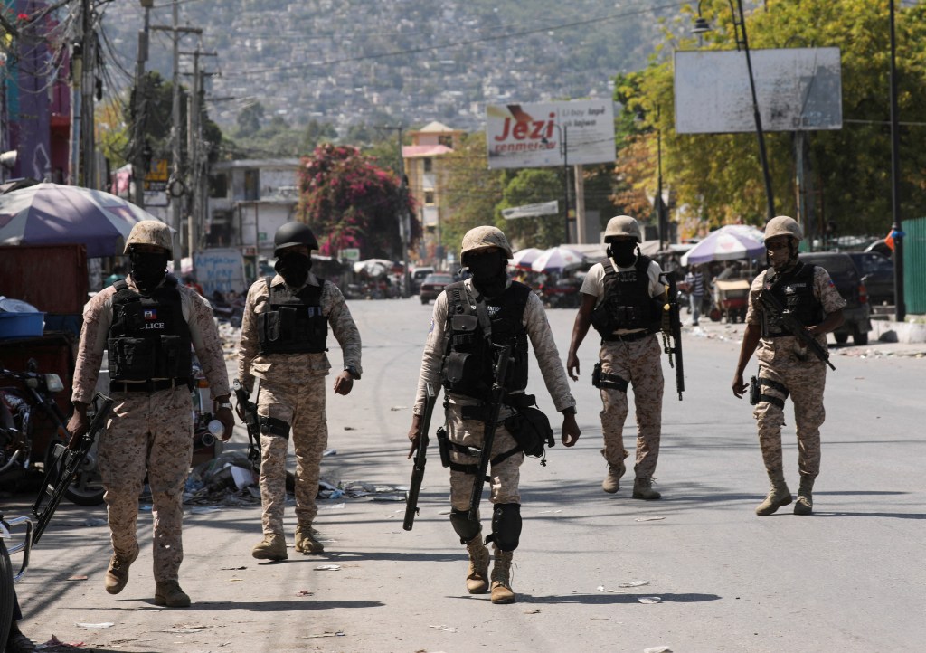 Police patrolling the street amid gang violence in Port-au-Prince on March 8, 2024.