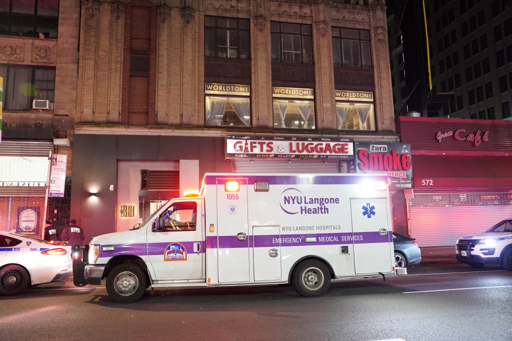 Ambulance seen outside The Music Building on 8th Avenue 