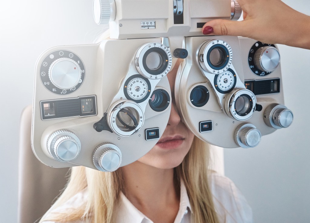 Woman undergoes eye exam