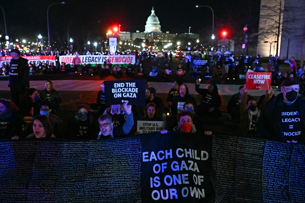 Pro-Palestinian demonstrators block a street during a protest ahead of US President Joe Biden's State of the Union address near the US Capitol in Washington, DC, on March 7, 2024. 