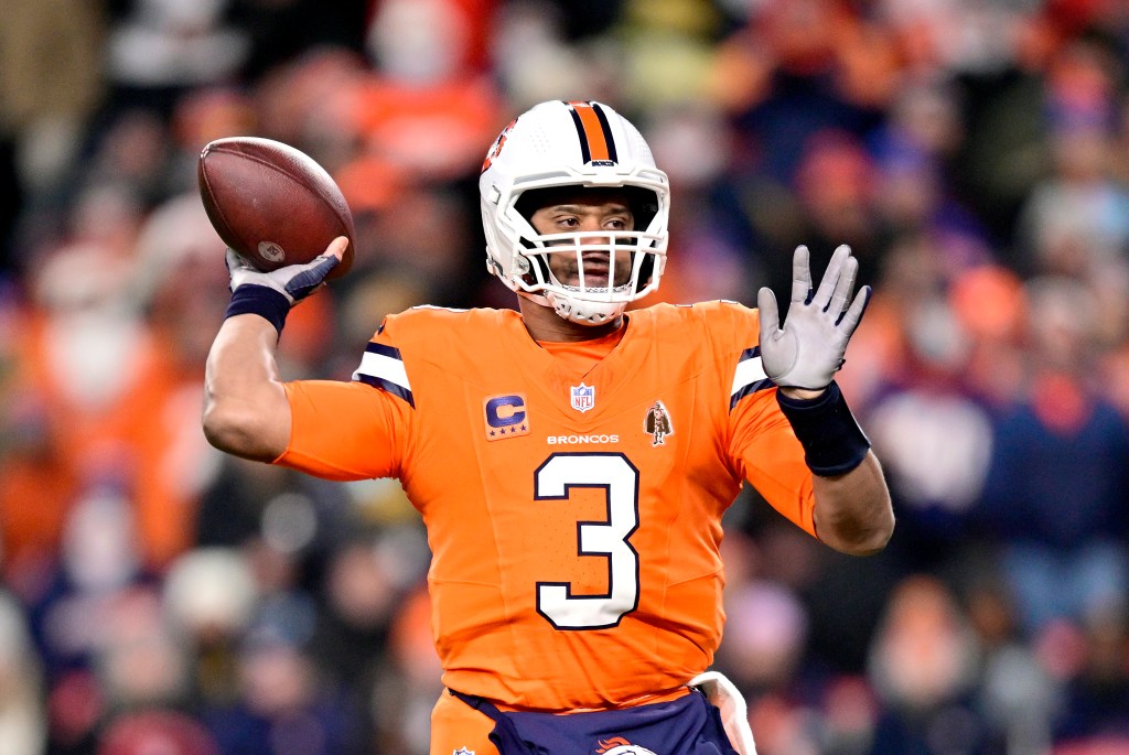 Quarterback Russell Wilson #3 of the Denver Broncos passes during the 1st quarter of the game against the New England Patriots at Empower Field At Mile High on December 24, 2023 in Denver, Colorado.  