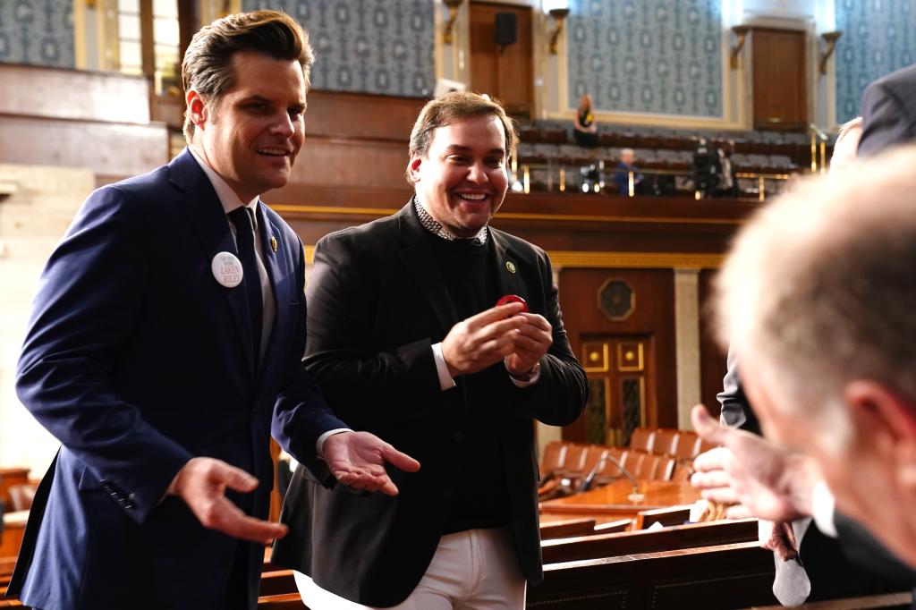 Rep. Matt Gaetz (R-FL) (L) talks with ousted Republican Rep. George Santos of New York ahead of the annual State of the Union address by President Joe Biden during a joint session of Congress in the House chamber at the Capital building on March 7, 2024 in Washington, DC. 