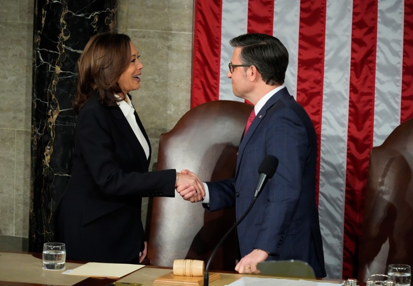 Vice President Kamala Harris and Speaker of the House Mike Johnson shake hands before President Joe Biden delivers the State of the Union address.