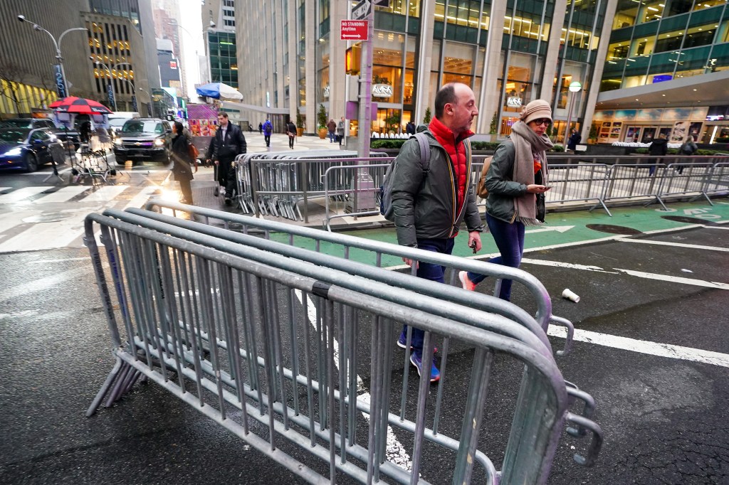 Metal barriers are set up for Biden's arrival and planned protests.