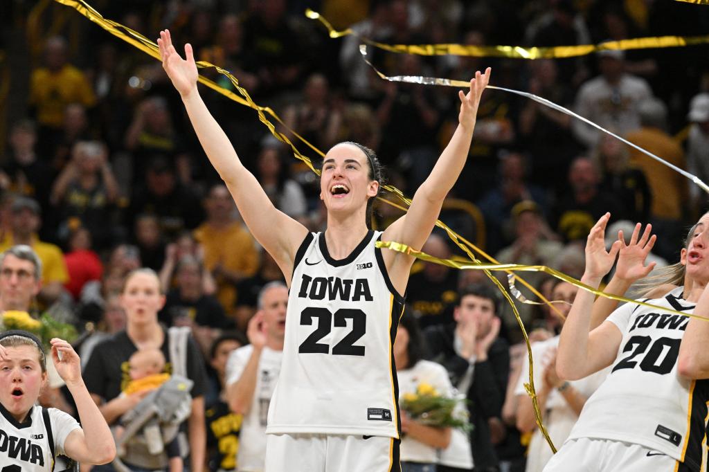 Caitlin Clark (22) reacts during senior day after the game against the Ohio State Buckeyes. Clark broke the NCAA basketball all-time scoring record during the second quarter. 